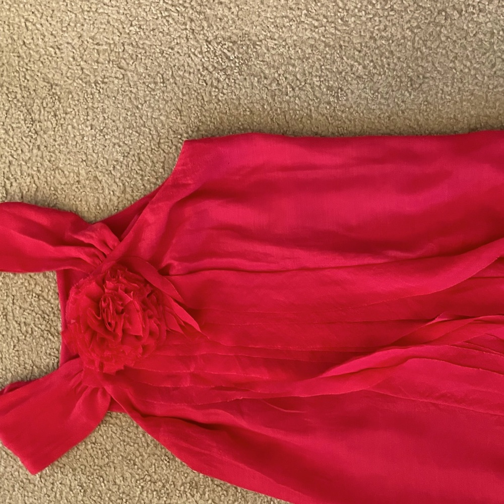 Fun floral detail halter in festive fuschia.